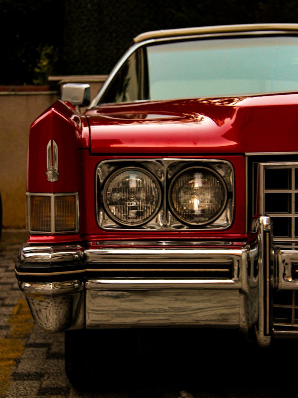 close up of classic red vintage car front