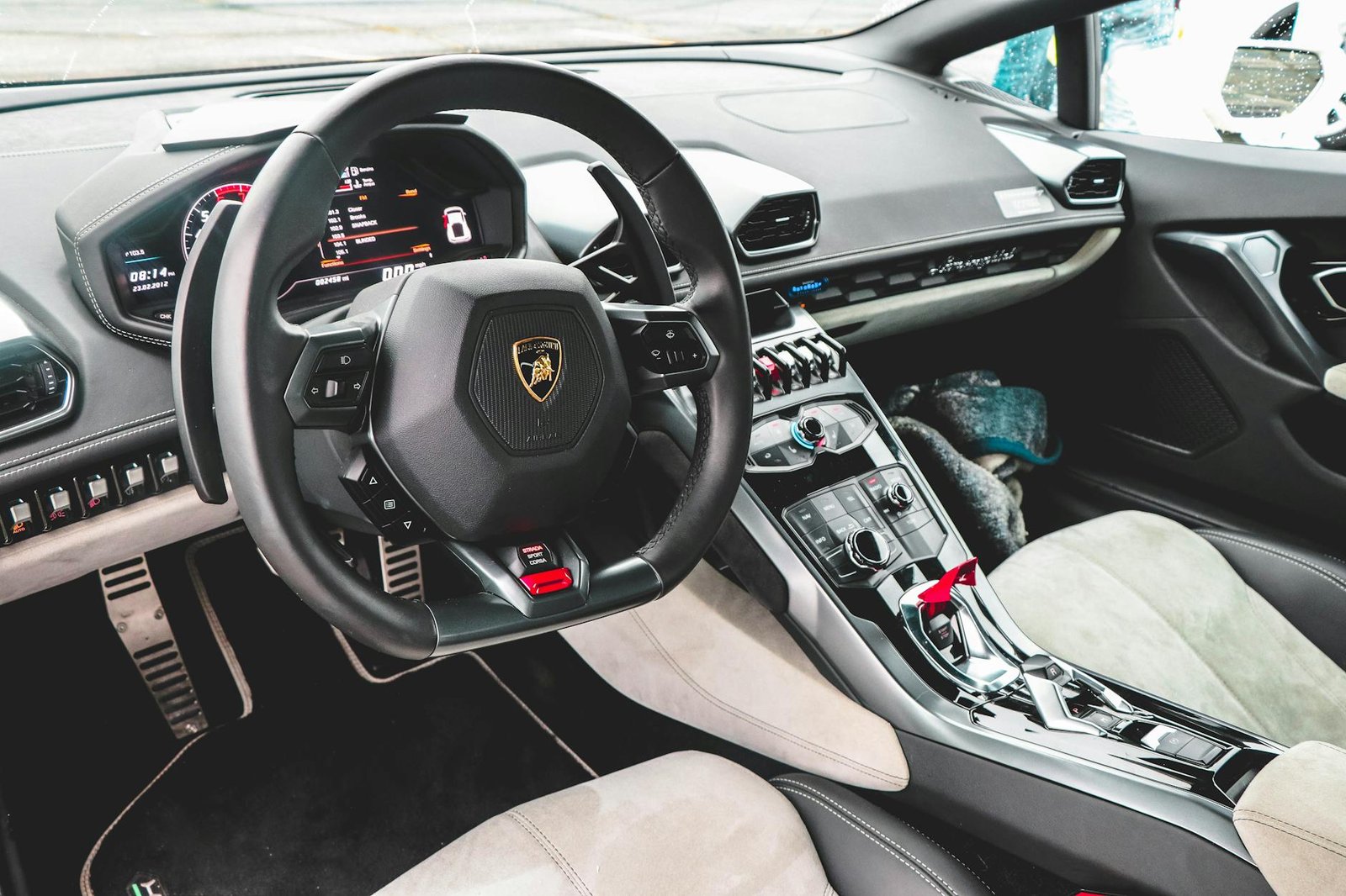 black lamborghini vehicle steering wheel