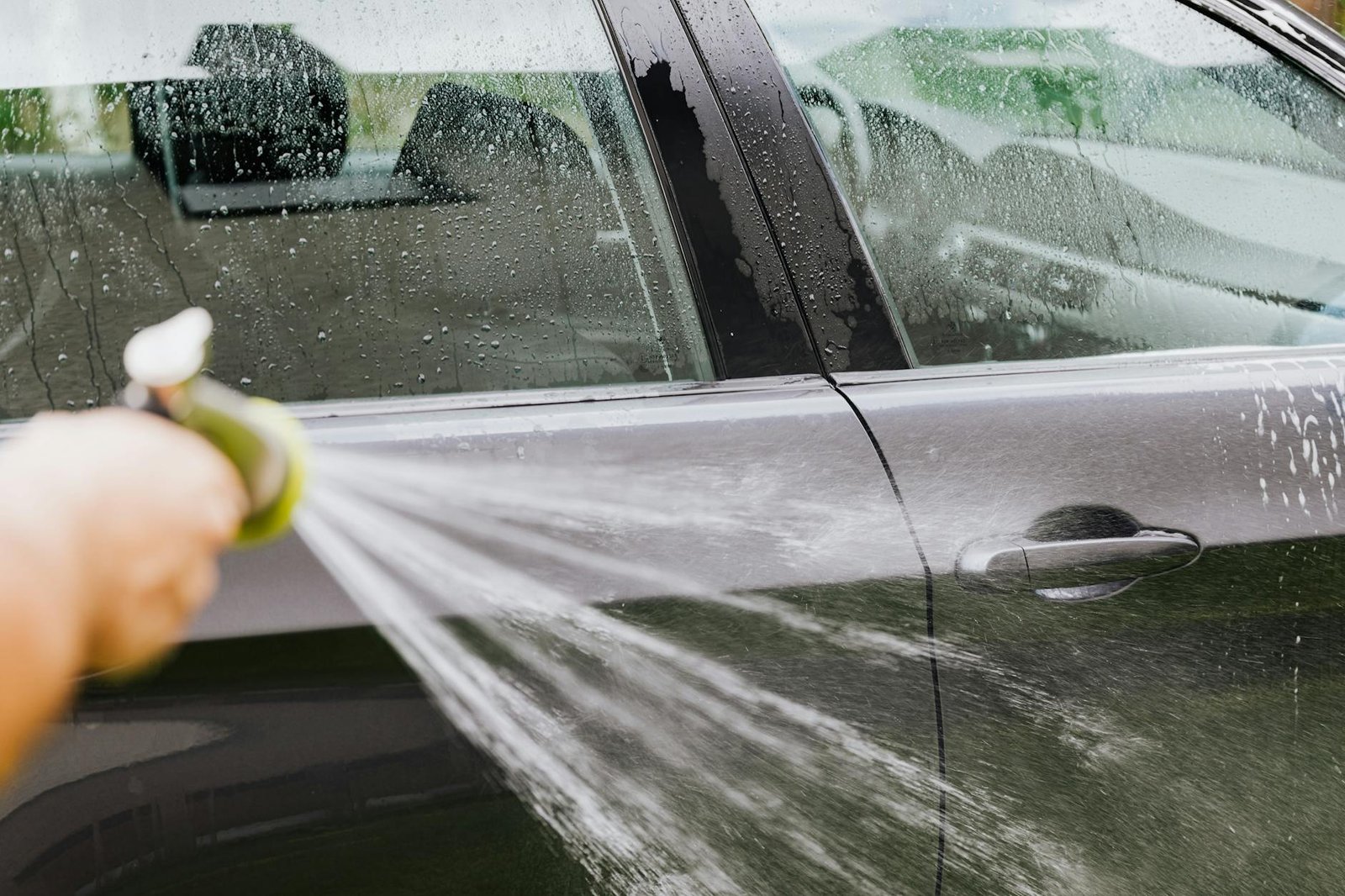 a person washing a car