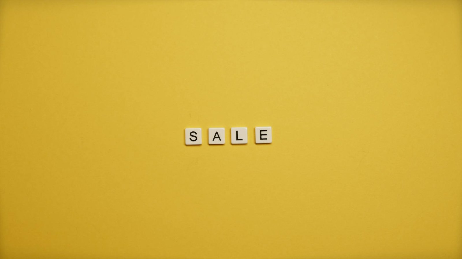 sale text on yellow background
