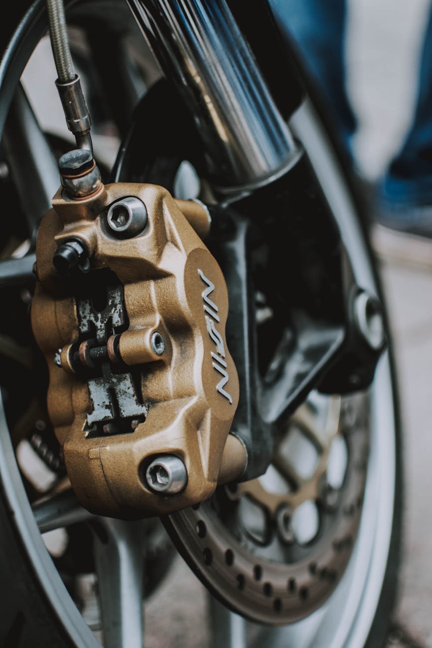 close up photo of motorcycle brake system